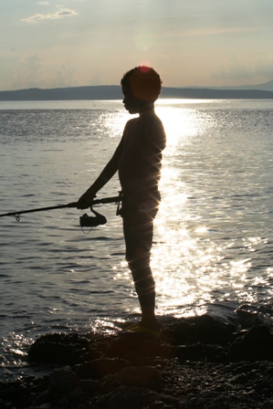 Partie de pche au coucher du soleil